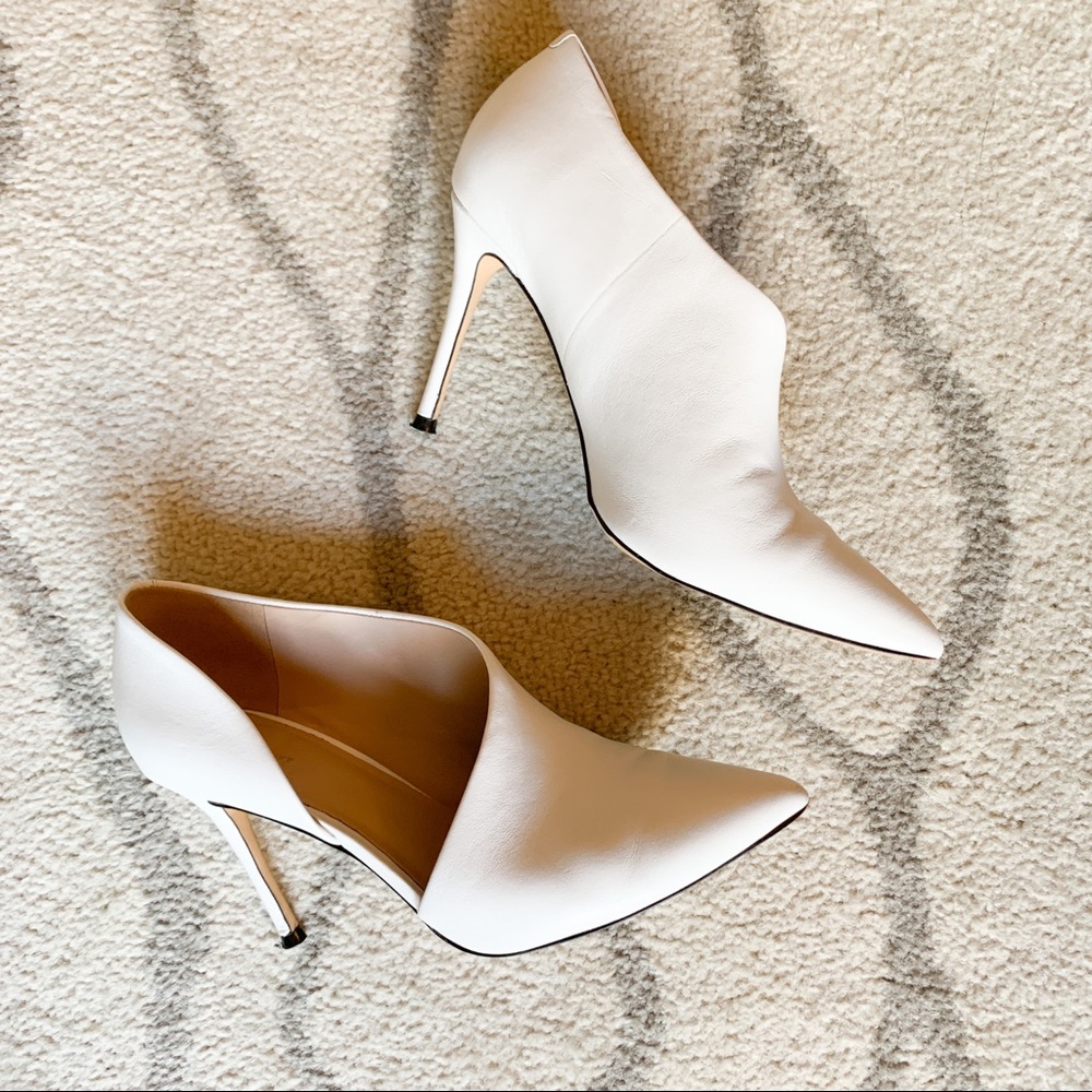 White pointed toe heels